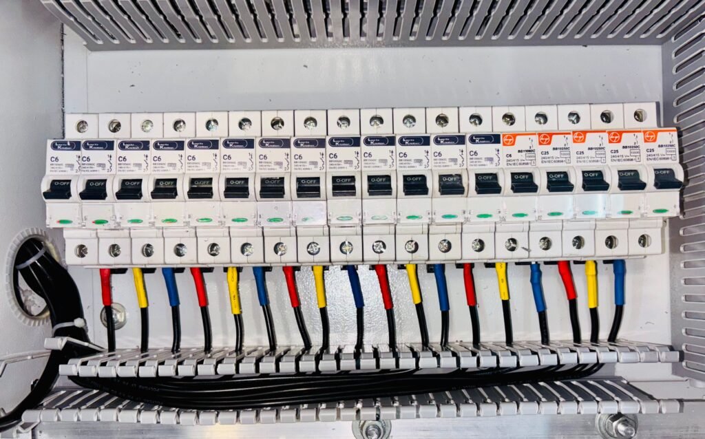 Close-up of an organized, up to code circuit breaker panel, representing electrical panel upgrade services in Odenville, AL