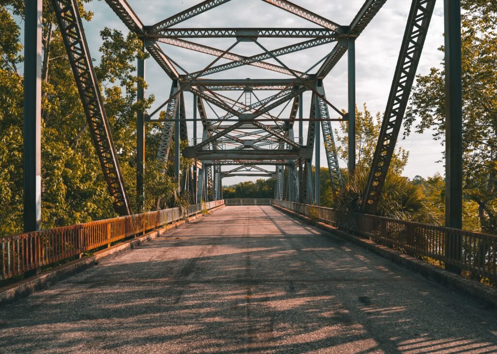 Steel truss river bridge similar to the Rooster Bridge in Demopolis, AL
